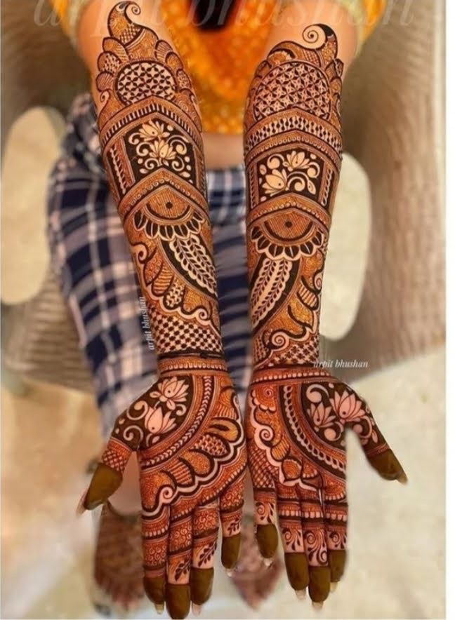 Mehndi artist applying henna cone — Vizag work 4